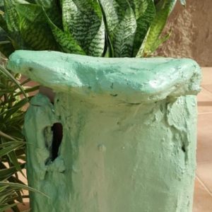 handmade concrete tall green garden tub with plant