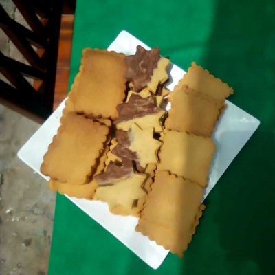 plate of star and flower shaped chocolate biscuits handmade by mariama in morro ilha do maio